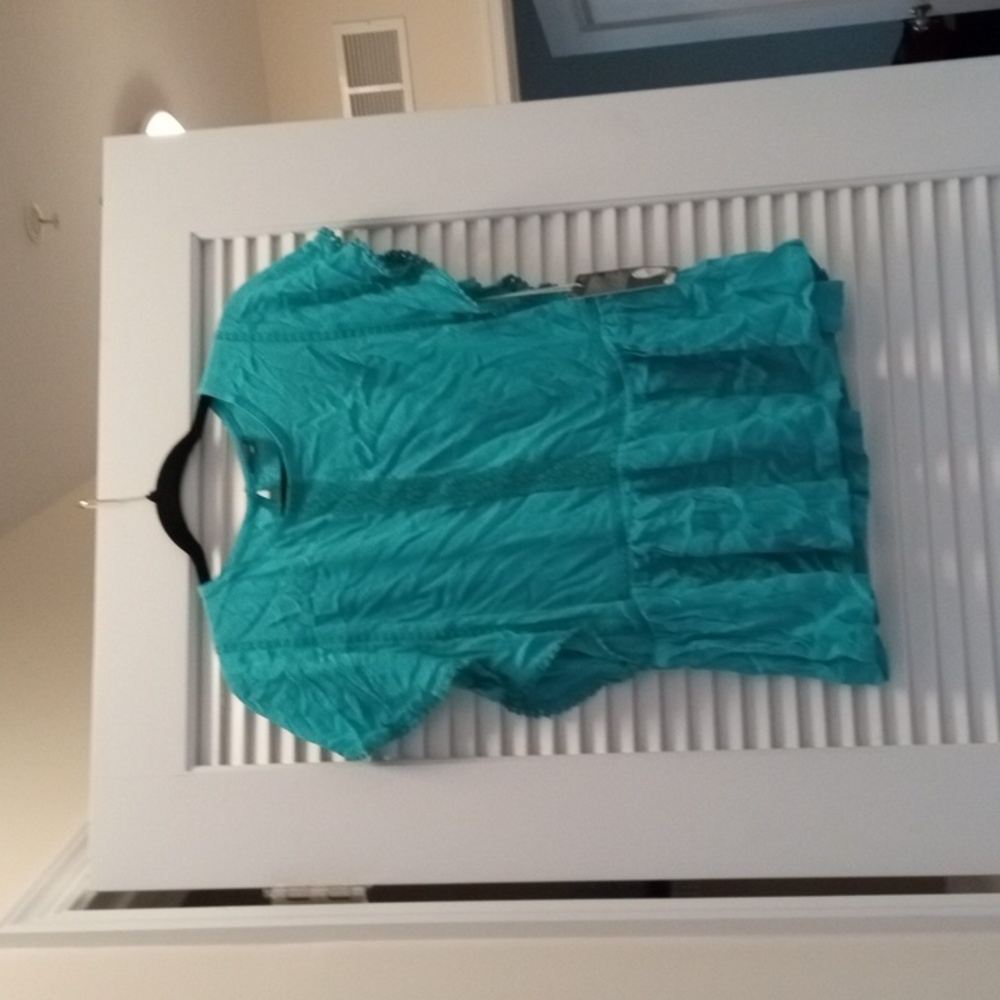 A teal top